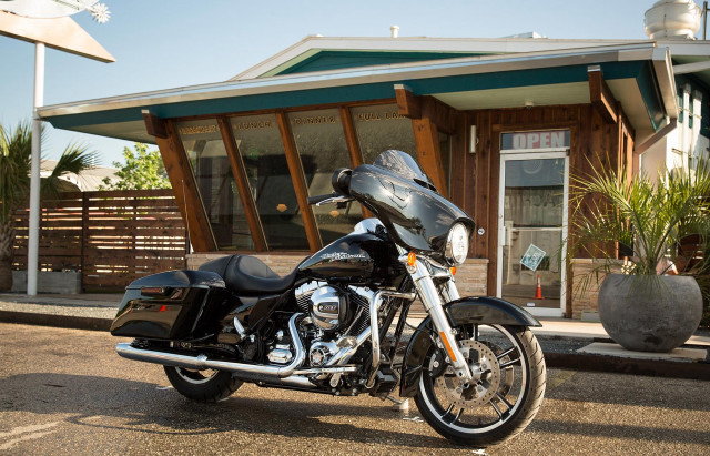 Motorcycle parked building sign description free wallpaper - medium preview image