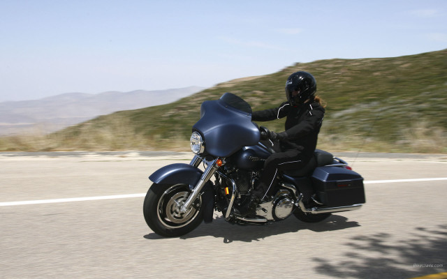Motorcycle ride hillside mountain sky free wallpaper - medium preview image