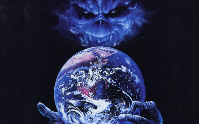 Man holding blue earth demon free wallpaper - medium preview image