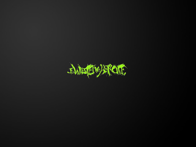 Black background green lettering says free wallpaper - medium preview image