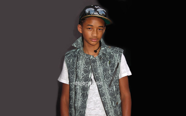 Young man green vest hat free wallpaper - medium preview image