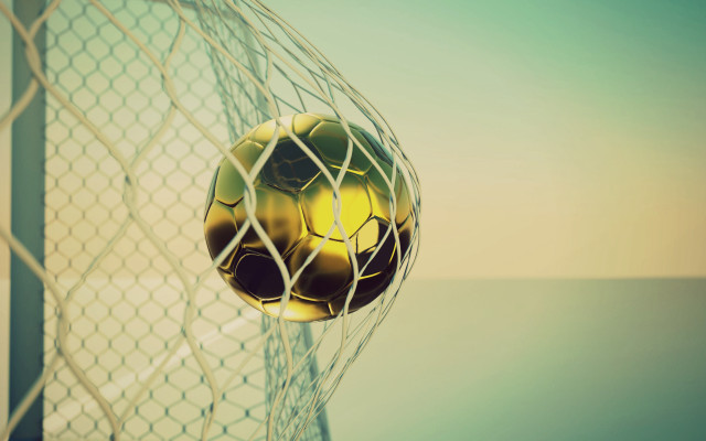 Soccer ball stuck in net #2 free wallpaper - medium preview image