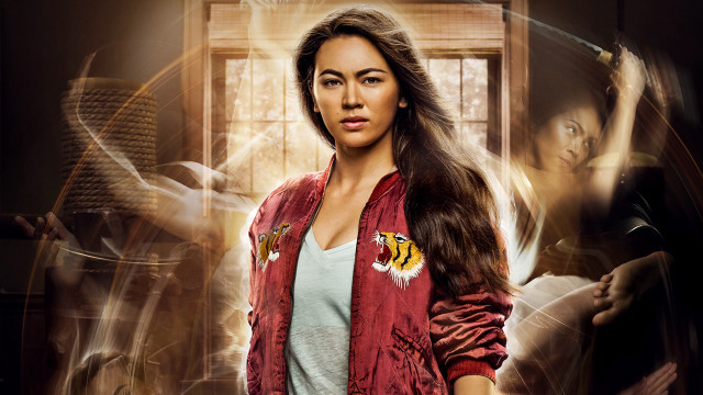 Woman standing window red jacket free wallpaper - medium preview image