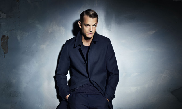 Man blue suit posing picture free wallpaper - medium preview image