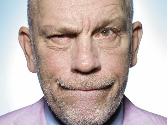 Bald man pink suit smiling free wallpaper - medium preview image