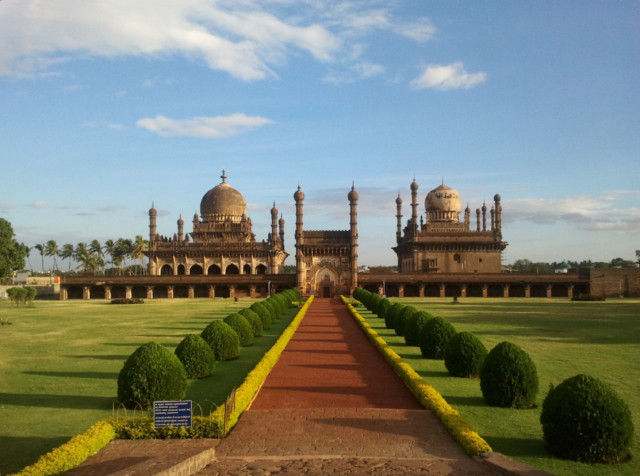 Large building walkway bushes blue free wallpaper - medium preview image