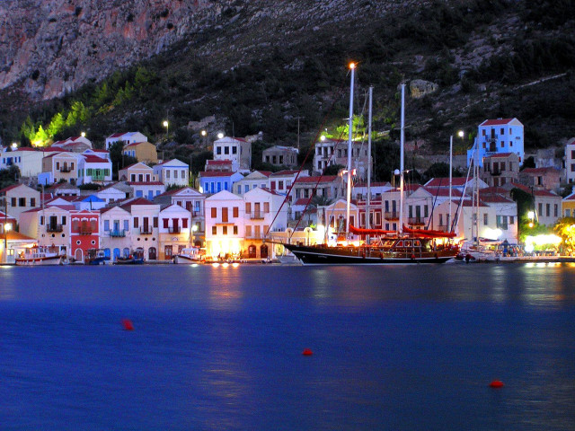 Harbor boats nighttime lights mountain free wallpaper - medium preview image