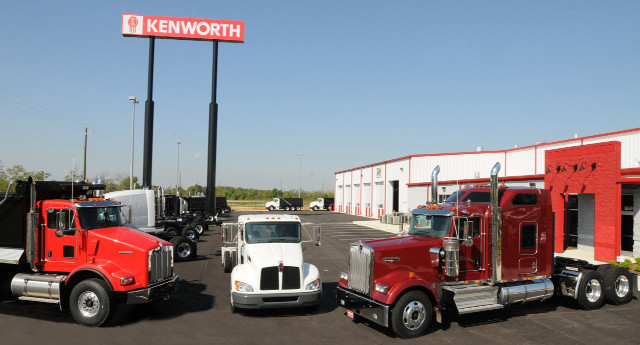 Semi trucks parked storefront kenworth free wallpaper - medium preview image