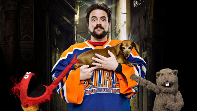 Man holding dog stuffed animal free wallpaper - medium preview image