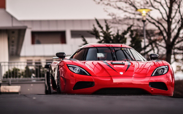 Red sports car parked street #2 free wallpaper - medium preview image