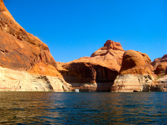 Boat water rocks mountain range free wallpaper for desktop - medium preview image