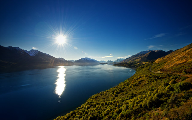 Mountain lake sunshine reflection beach free wallpaper - medium preview image