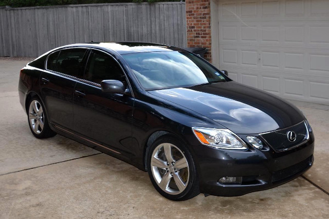 Black car driveway garage brick free wallpaper - medium preview image