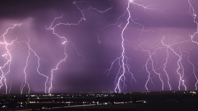 Lightning strikes city night time free wallpaper - medium preview image