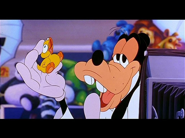 Cartoon character holding small toy free wallpaper - medium preview image