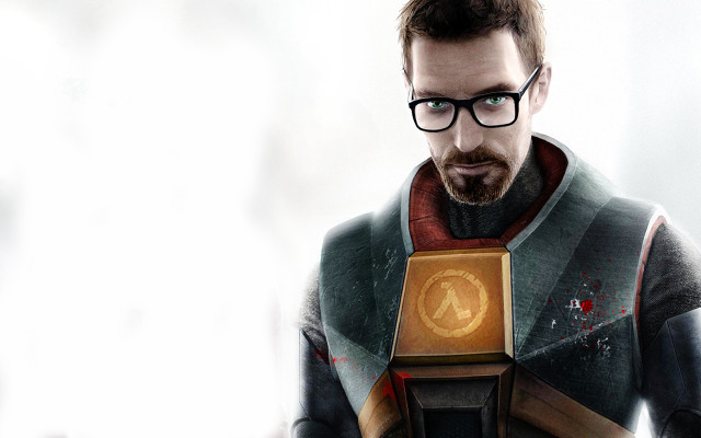 Man glasses holding object serious free wallpaper - medium preview image