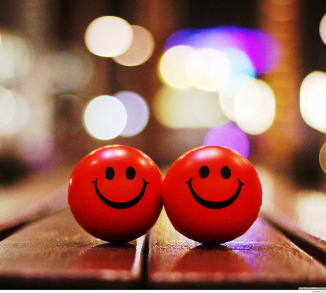 Two red balls with faces free wallpaper - medium preview image