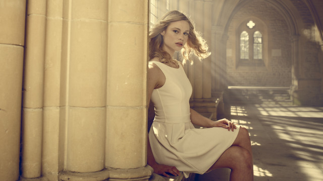 Woman white dress stone bench free wallpaper - medium preview image