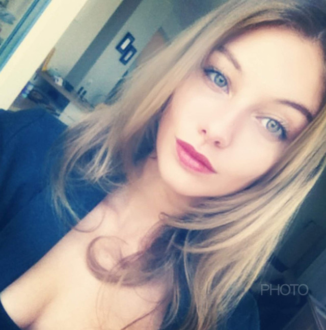 Woman blue eyes black shirt #6 free wallpaper - medium preview image