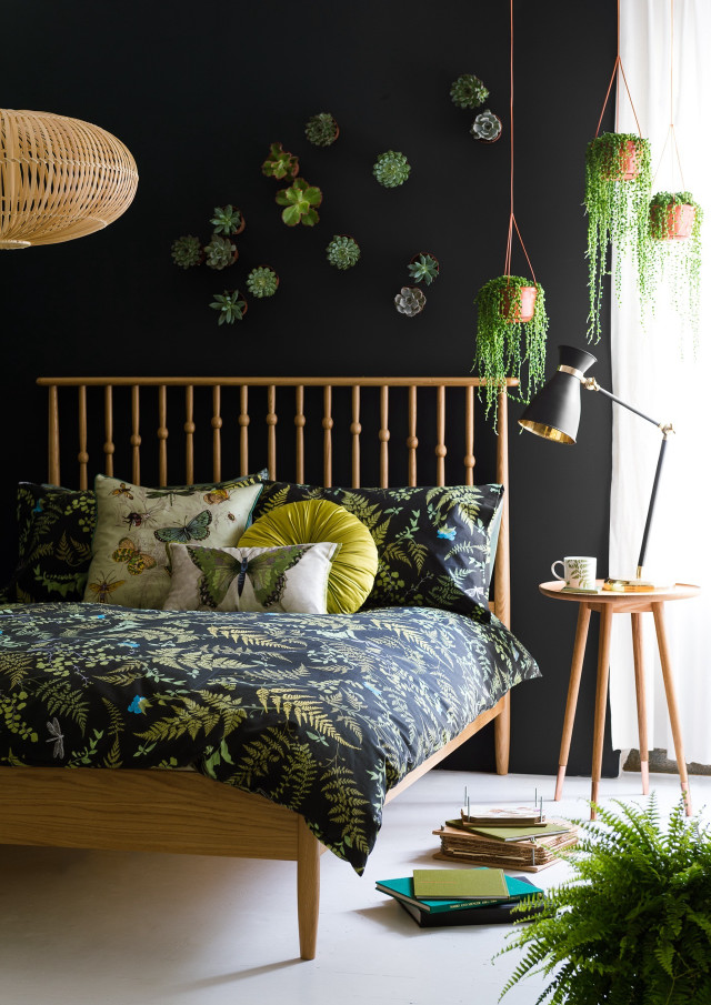 Bed green comforter plant wall free wallpaper - medium preview image