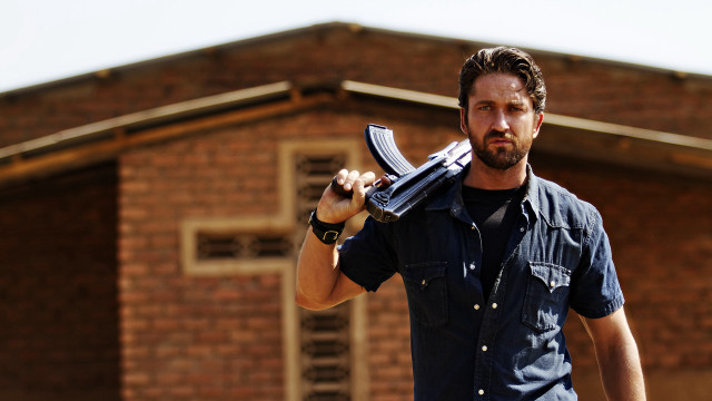 Man holding scissors brick building free wallpaper - medium preview image
