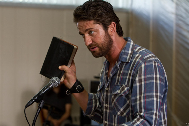 Man holding microphone book standing free wallpaper - medium preview image
