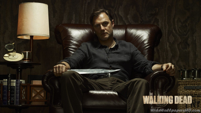 Man sitting chair book lap free wallpaper - medium preview image