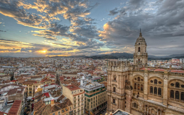 City clock tower cloudy sky free wallpaper - medium preview image