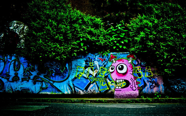 Graffiti covered face bush green free wallpaper - medium preview image