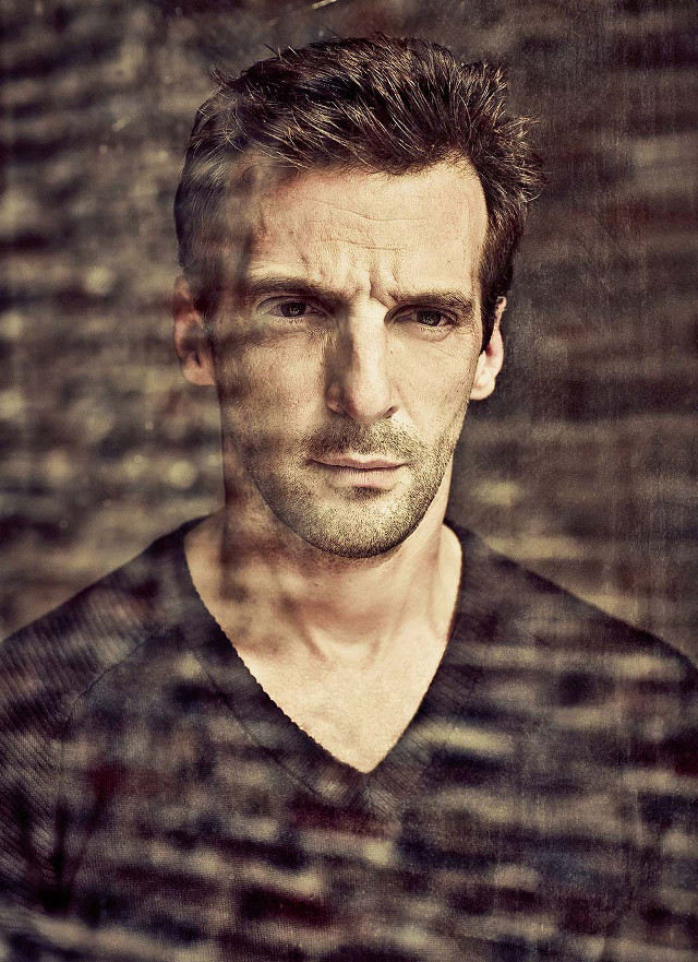 Man black shirt serious look #5 free wallpaper - medium preview image