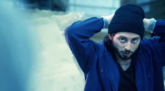 Man beanie hands to ears free wallpaper - medium preview image