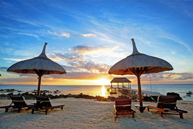 Beach chairs umbrellas sunset pier free wallpaper - medium preview image