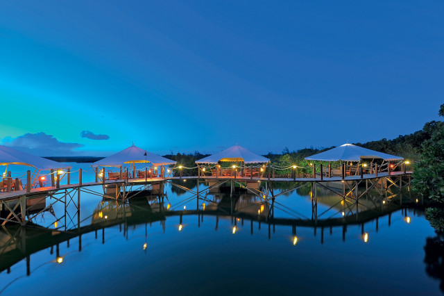 Pier tables umbrellas night lights free wallpaper - medium preview image