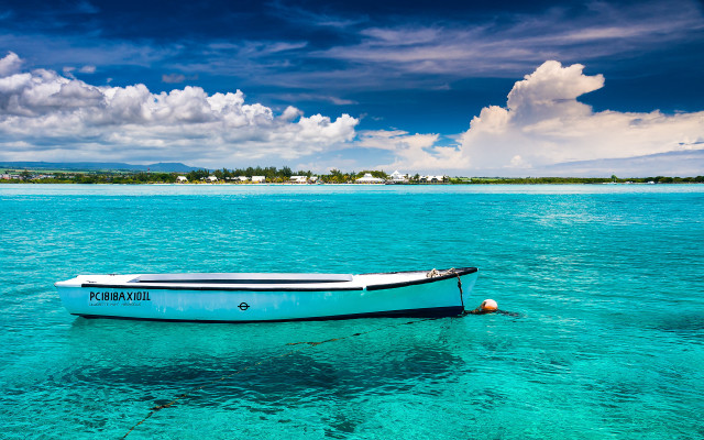 Small boat floating water shoreline free wallpaper - medium preview image