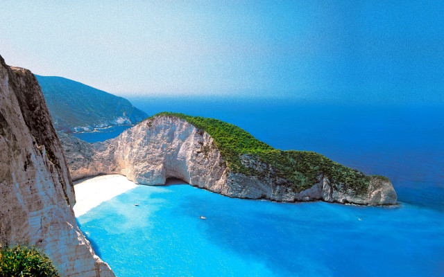 Large rock formation water beach free wallpaper - medium preview image