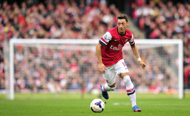Man red shirt playing soccer #3 free wallpaper - medium preview image