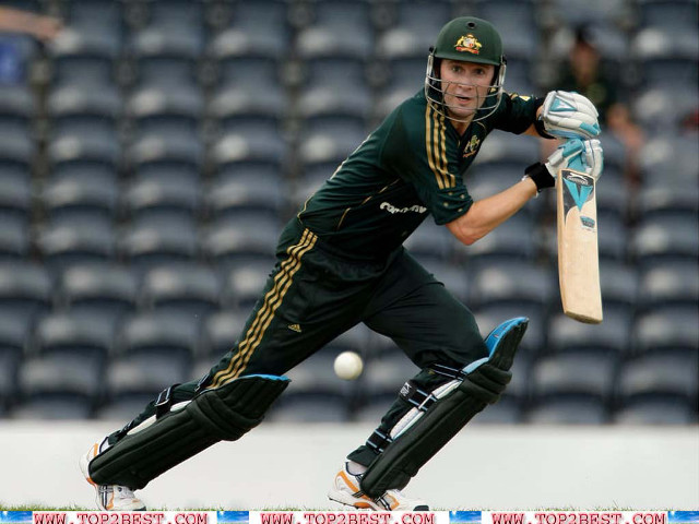 Man green uniform swinging bat free wallpaper - medium preview image