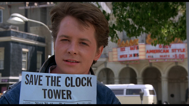 Man holding sign save the free wallpaper - medium preview image