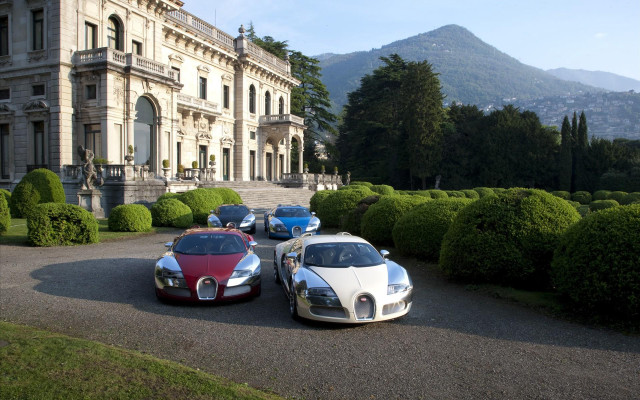 Cars parked building bushes clock free wallpaper - medium preview image