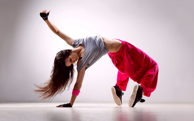 Woman handstand dancefloor dynamic graffiti free wallpaper - medium preview image