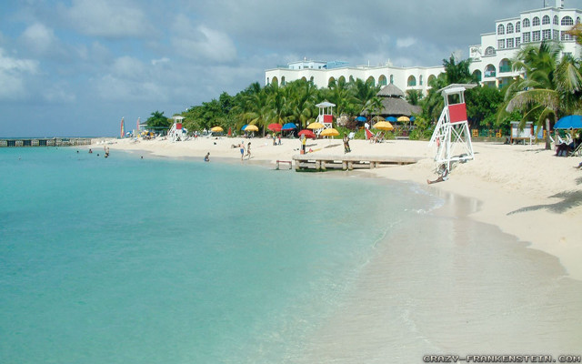 Beach white building blue water free wallpaper - medium preview image