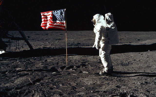 Astronaut standing moon flag surface #2 free wallpaper - medium preview image