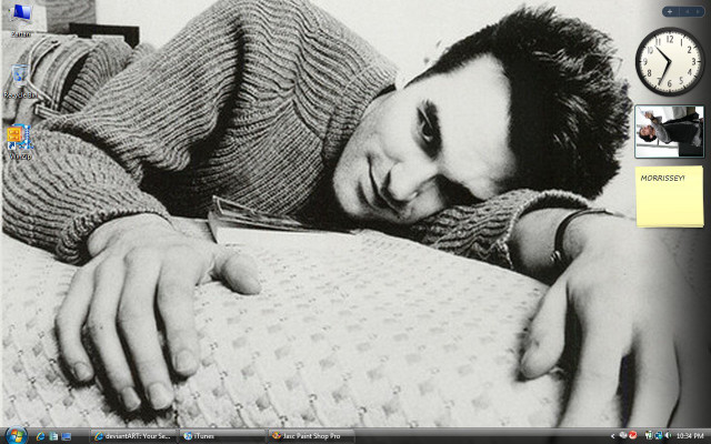 Man laying bed clock laptop free wallpaper - medium preview image