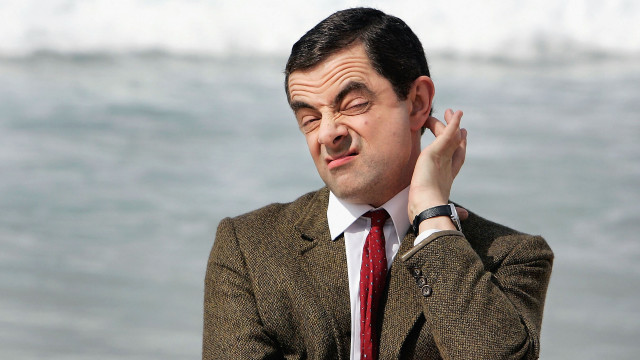 Man suit tie holding head free wallpaper - medium preview image