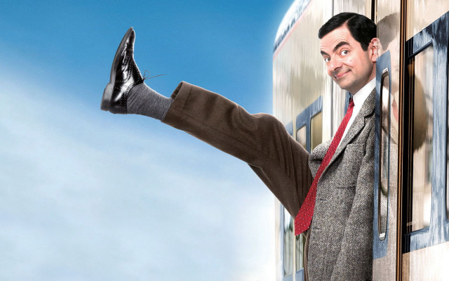 Man suit tie leaning wall #3 free wallpaper - medium preview image