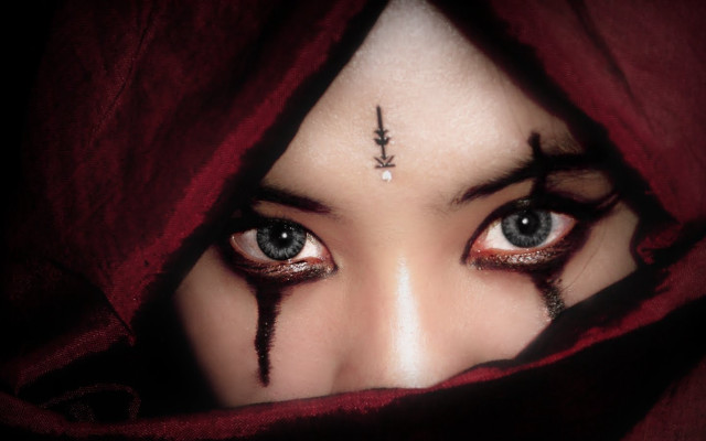 Woman cross forehead red cloth free wallpaper - medium preview image