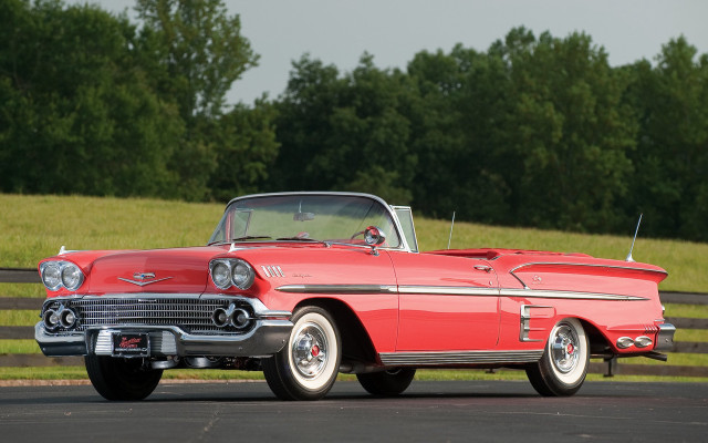 Red classic car driving road free wallpaper - medium preview image