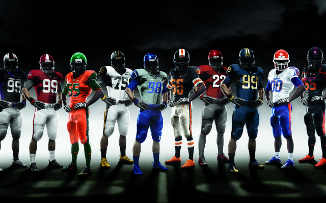 Football players standing helmets hands free wallpaper - medium preview image