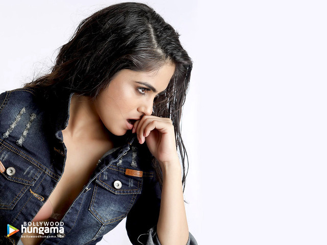 Woman denim jacket posing hand free wallpaper - medium preview image