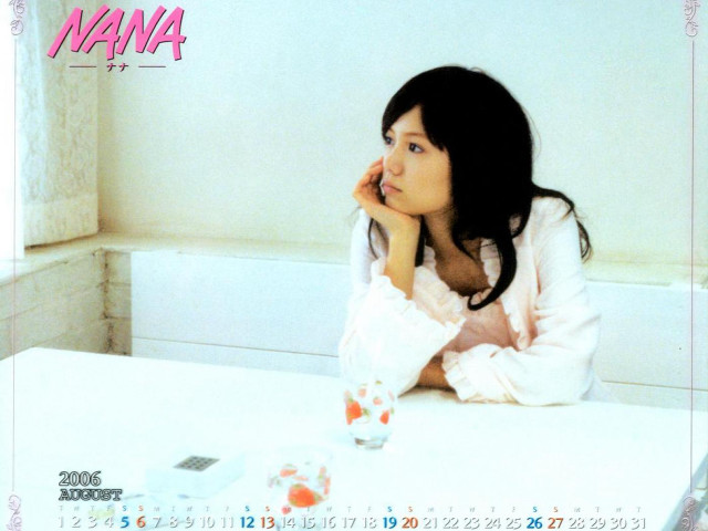 Woman sitting table coffee calendar free wallpaper - medium preview image